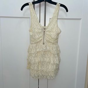 Moda International cream peplum ruffle top